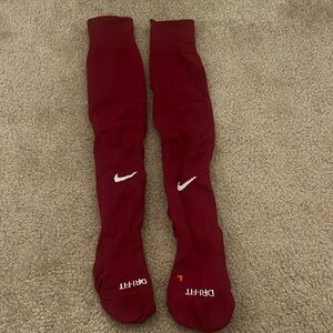 Red/maroon Nike soccer socks